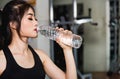 Young woman girl lifestyle sport drinking water on bottle after workout exercise cardio