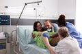 Young woman giving birth to child in hospital ward Royalty Free Stock Photo