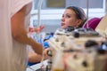 Young woman giving blood in a modern hospital Royalty Free Stock Photo