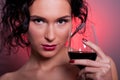 Young woman with glass of red wine Royalty Free Stock Photo