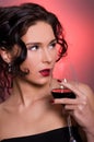 Young woman with glass of red wine Royalty Free Stock Photo