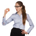Young woman in glasses holding a chicken egg Royalty Free Stock Photo