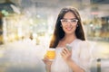Young woman with glasses out in the city Royalty Free Stock Photo