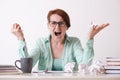A young woman with glasses in a rage crudged the paper sheets Royalty Free Stock Photo