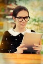 Young Woman with Glasses and Tablet Royalty Free Stock Photo