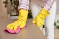 young woman cleaning table with microfiber cloth. Royalty Free Stock Photo
