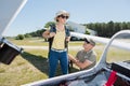 young woman going on board glider Royalty Free Stock Photo