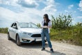 Young woman got lost and looking to a map for planning new trip Royalty Free Stock Photo