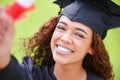 Young woman, graduate and portrait with certificate, smile and celebration for success, goal and dream at college