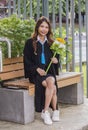 Young woman with graduation gown after graduation Royalty Free Stock Photo