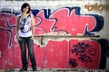 Young woman and graffiti Royalty Free Stock Photo