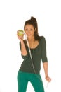Young woman with granny smith apple