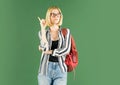 Young woman on green blackboard background - for text copy space. Portrait of college student in college. Female student Royalty Free Stock Photo