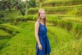 Young woman on Green cascade rice field plantation at Tegalalang terrace. Bali, Indonesia Royalty Free Stock Photo