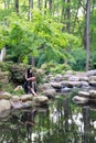 Young woman in green park, book and reading. Happiness, beautiful Royalty Free Stock Photo