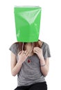 Young Woman with Green Shopping Bag on Head Royalty Free Stock Photo