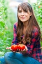 Young woman in a greenhouse Royalty Free Stock Photo
