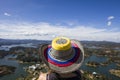 Young woman at Guatape lake in Antioquia, Colombia