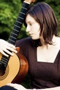 Young woman with guitar Royalty Free Stock Photo