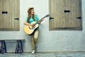 Young woman guitar play. Hipster girl portrait Royalty Free Stock Photo