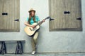 Young woman guitar play. Hipster girl portrait Royalty Free Stock Photo