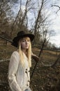 Young woman with a gun over her shoulder Royalty Free Stock Photo