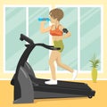 Young woman at gym doing exercise on treadmill with smartphone armband drinking water Royalty Free Stock Photo