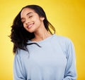 Young woman, hair and beauty, happy and satisfaction with gen z, fashion on yellow studio background. Happiness, youth Royalty Free Stock Photo