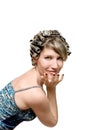 Young woman with haircurlers in her heir Royalty Free Stock Photo