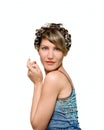 Young woman with haircurlers in her heir Royalty Free Stock Photo