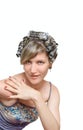 Young woman with haircurlers in her heir Royalty Free Stock Photo