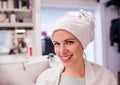 Young woman at hairdresser salon having her hair done. Royalty Free Stock Photo