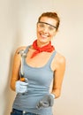 Young woman with hammer in hands. Royalty Free Stock Photo