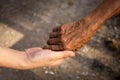 Young woman hand holding elderly person`s hand Royalty Free Stock Photo