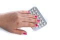 Young woman hand holding a contraceptive pills blister Royalty Free Stock Photo