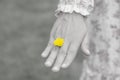 Young woman hand wearing Yellow flower represent of wedding ring Royalty Free Stock Photo