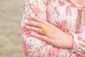 Young woman hand wearing Yellow flower represent of wedding ring Royalty Free Stock Photo