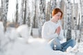 Young beautiful woman praying in forest Royalty Free Stock Photo