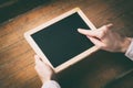 Young woman hands holding little board