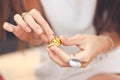 Young woman hands unwrap chocolate close-up Royalty Free Stock Photo