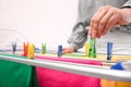 Young woman hanging clean laundry on drying rack, closeup Royalty Free Stock Photo