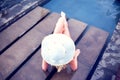 Young woman happy in big hat relaxing on the swimming pool, travel near the sea and beach. Concept summer Royalty Free Stock Photo