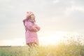 Young woman is happy with the flowers while sunset and winter is Royalty Free Stock Photo