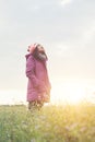 Young woman is happy with the flowers while sunset and winter is Royalty Free Stock Photo