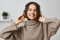 young woman happy music indoor joy student headphones caucasian home earphones Royalty Free Stock Photo