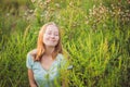 Young woman happy because no longer feels allergic to ragweed Royalty Free Stock Photo