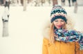 Young Woman happy smiling wearing hat and scarf walking outdoor Royalty Free Stock Photo