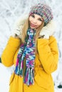 Young Woman happy smiling wearing hat and scarf walking outdoor Royalty Free Stock Photo