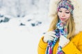 Young Woman happy smiling wearing hat and scarf walking outdoor Royalty Free Stock Photo