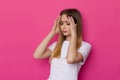 Young Woman Has A Headache And Is Holding Her Head In Her Hands Royalty Free Stock Photo